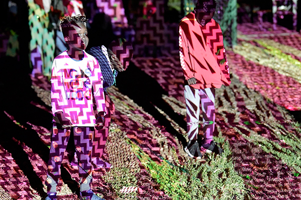 A view of an immersive projection work by artist Kate Geck at the Atherton Gardens flats in 2018 for the Gertrude St Projection Festival.