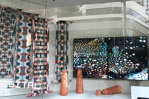 Installation view of the work Crypto Mori made by Kate Geck, Emma Luke and Judith Glover in 2022 for Melbourne Design Week. A series of textiles made with machine learning as well as augmented reality projections, a video art work and 3D printed ceramics.